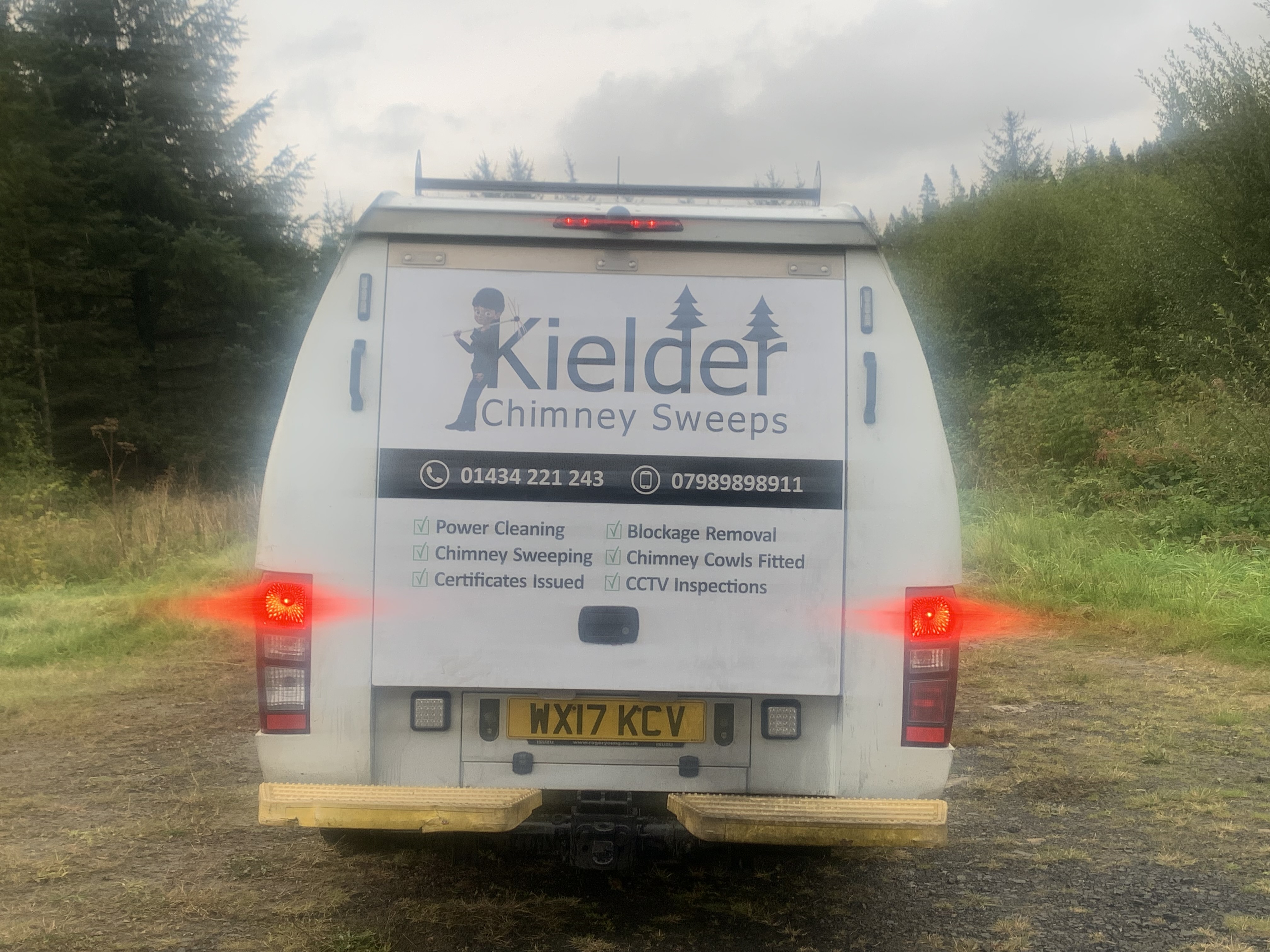 Kielder Chimney Sweeps van with doors open